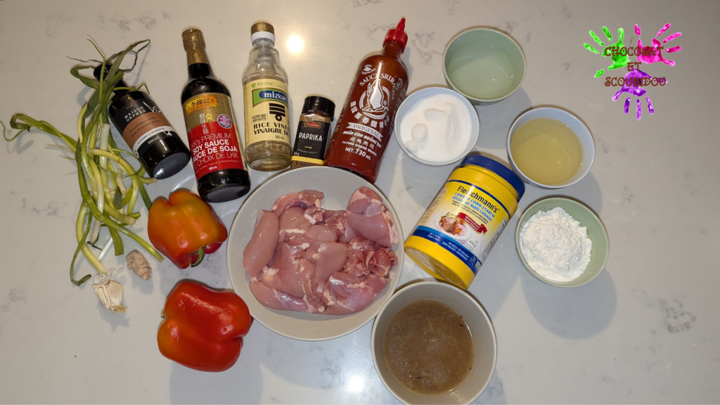 Ingrédients pour cuisiner un plat de poulet général Tao : sauce soya, bouillon de poulet, vinaigre de riz, gingembre moulu, gousses d’ail, fécule de maïs, paprika doux, sauce sriracha, huile de sésame grillé, sucre, eau, poivrons rouges, huile de canola, hauts de cuisses de poulet désossés et sans la peau, farine tout usage non blanchie, oignons verts